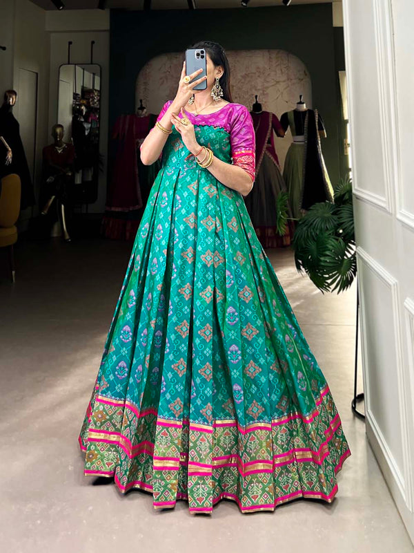 Bottle Green Color Jacquard Silk Patola Print With Zari Weaving Work Gown