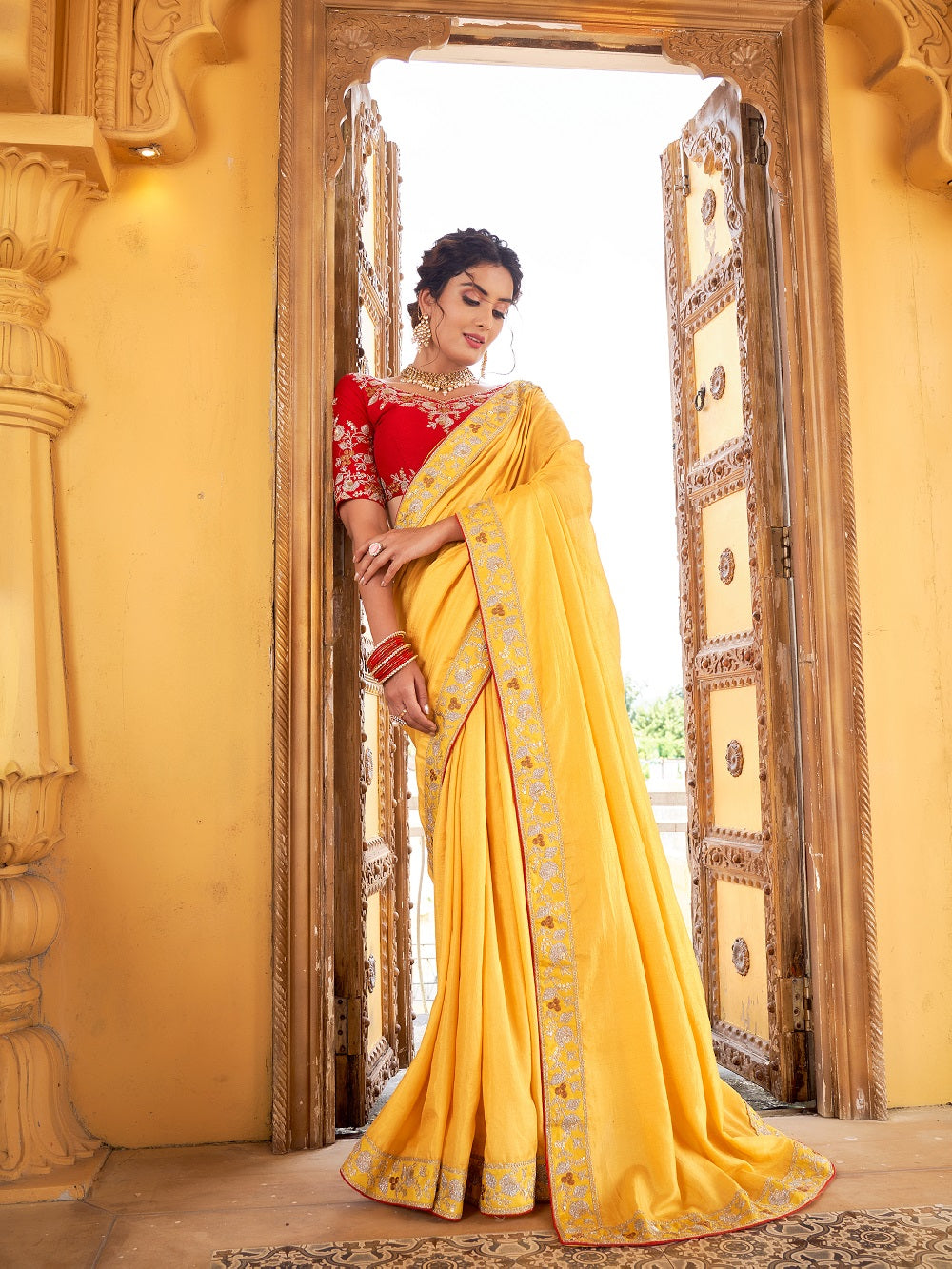 Vibrant Yellow Silk Saree With Heavy Embroidered Pink Blouse – RawaazFashion